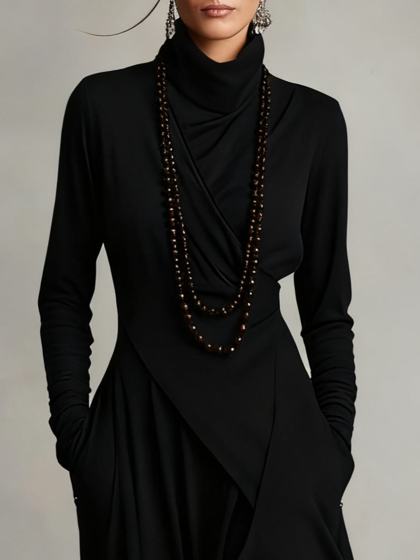 Aurelia · Vestito maxi plissettato asimmetrico con colletto alto