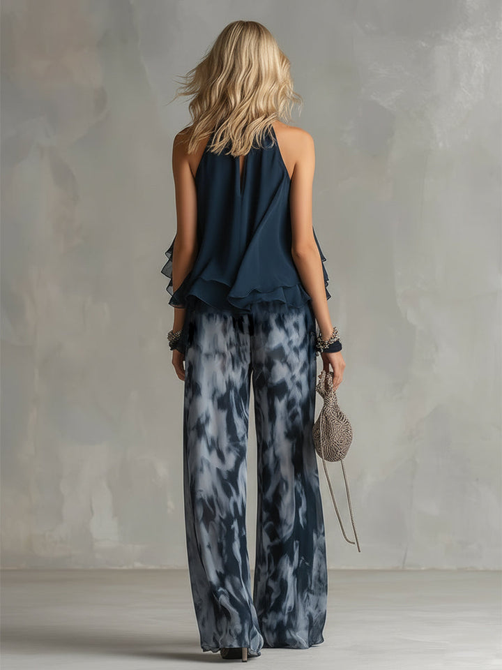 Ludovica | elegante in chiffon con top a collo alto e pantaloni larghi stampati